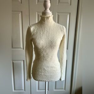Dreamy soft, off white turtleneck sweater w scalloped edges